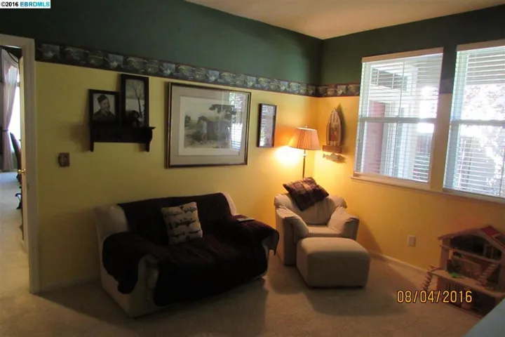 This room could be bedroom #5! It can also be a lovely in-law area!