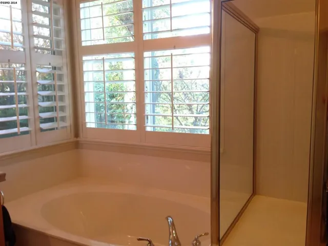 Take your pick.... refreshing shower or relaxing bath.
