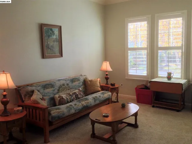 Living room and Dining room meet to provide a great space for elegant or informal entertaining.