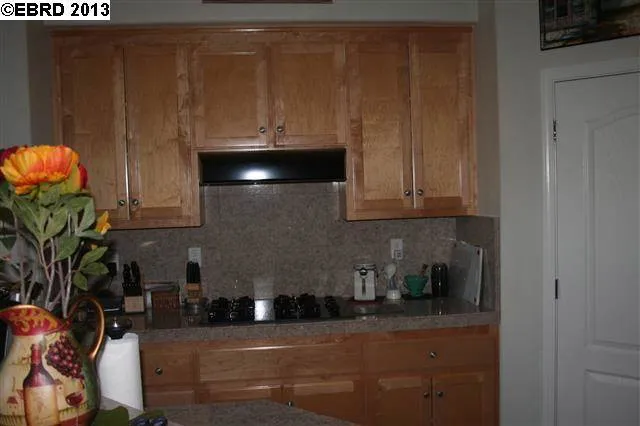 Kitchen shows gas range
