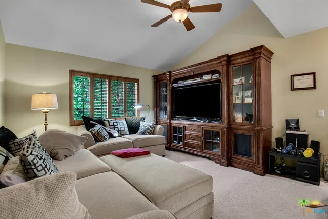 Large den opens to living room.