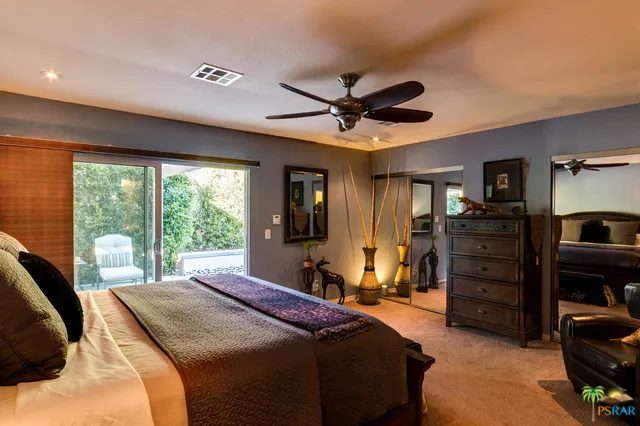 Master Bedroom wiht Sliders to Pool