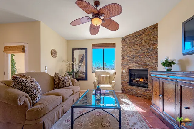 Custom stone fireplace in the South-faci