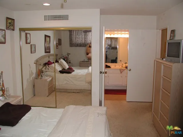 Bedroom with entrance to bath