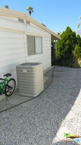 Newer AC Unit In The Rear Yard