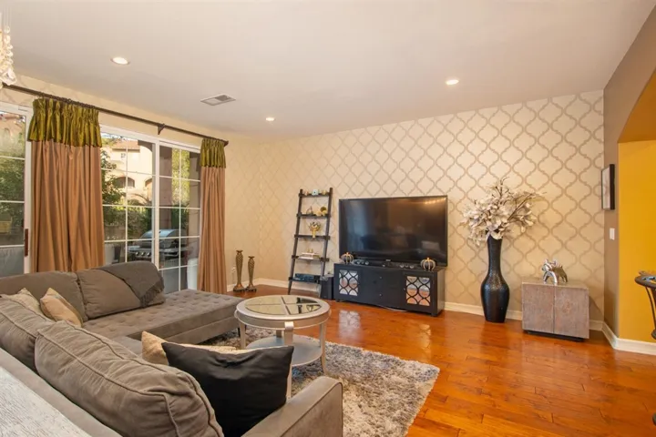 Open floor plan connects to kitchen and dining area