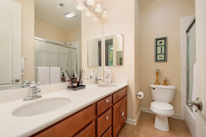 Upstairs hall bath adjacent to bedroom #2 and #3