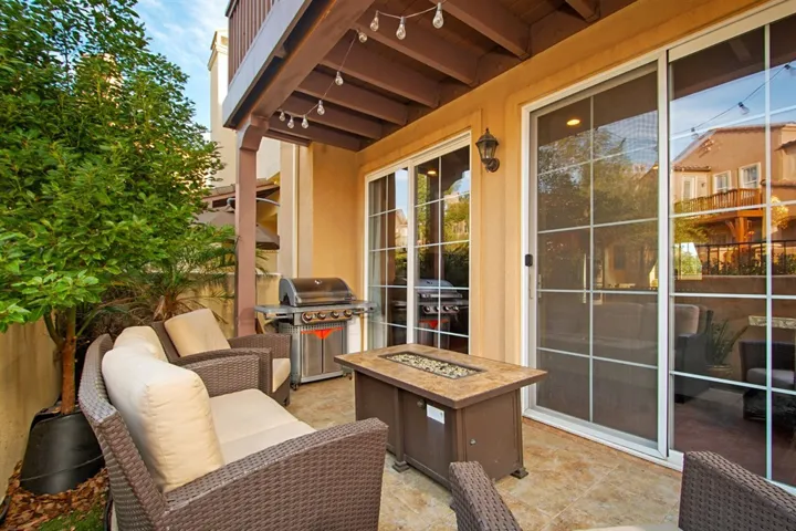 Cozy patio near front door entrance.  Great for entertaining or evening dining.