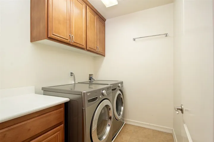 Upstairs laundry room located close to the bedrooms and baths