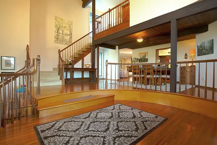 Dramatic volume in the formal entry with beam ceilings!