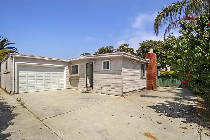 Spacious 1-car garage and additional parking.
