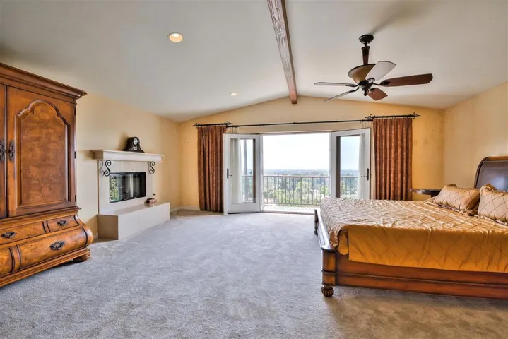 Vaulted Ceilings with Beam and Ceiling fan.. Home has Two Central Air Conditioners and two Heating units (propane).