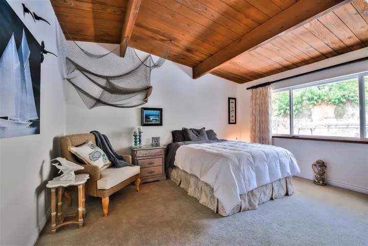 Downstairs Bedroom with beamed ceilings and En suite bathroom with walk in shower