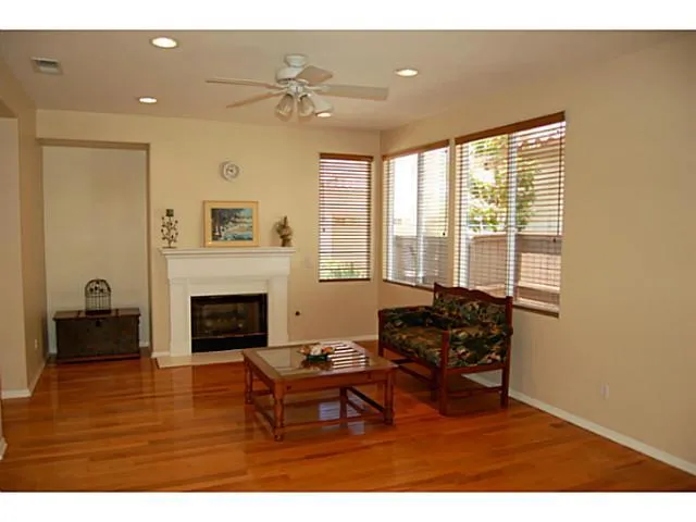 Large Light and bright family room with Dining Area open to Kitchen.
