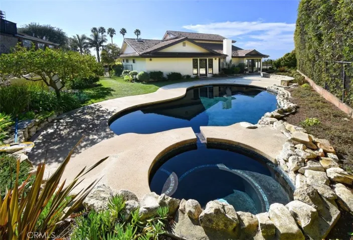Black bottom heated pool and jacuzzi.