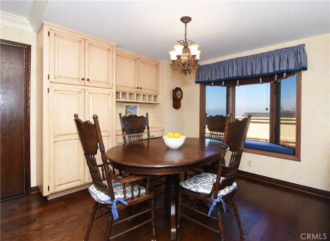 Eat in kitchen with built in storage and desk area. Bay window with amazing views.