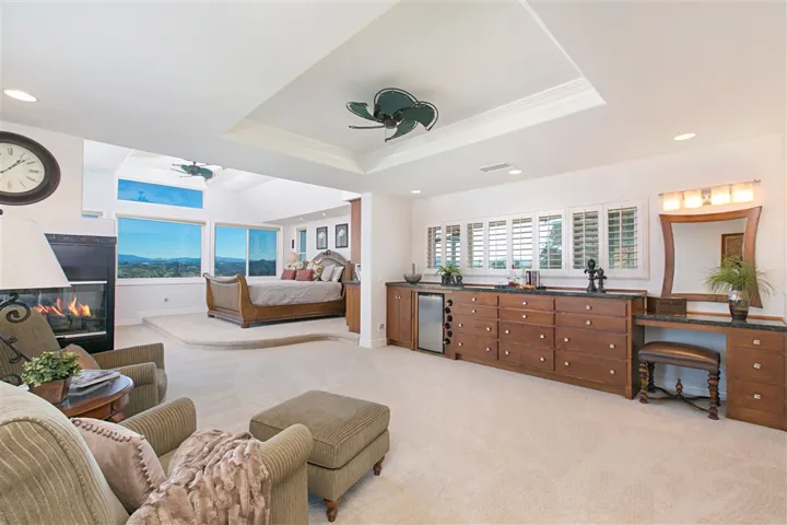 Palatial Master Bedroom 32x17 has plenty of storage.  Built in bureau with cabinets and drawers allows you to put everything away. Newly painted and carpeted. Flat Screen TV mounted at the perfect angle for late night TV watching.