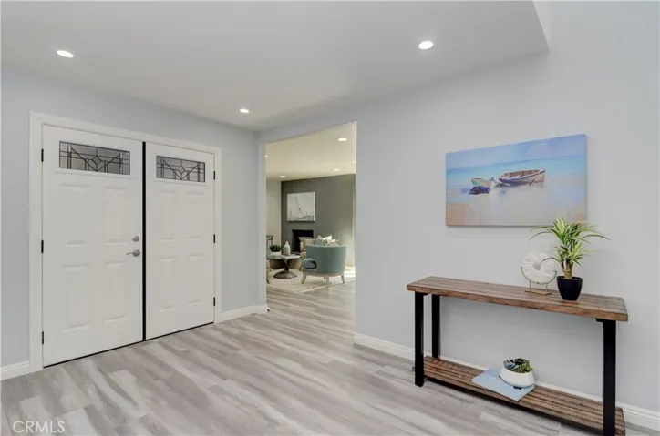 Large entry foyer is a great place to greet guests, and makes a wonderful transition from living to sleeping areas.