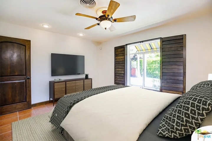 Virtually staged second bedroom with lar