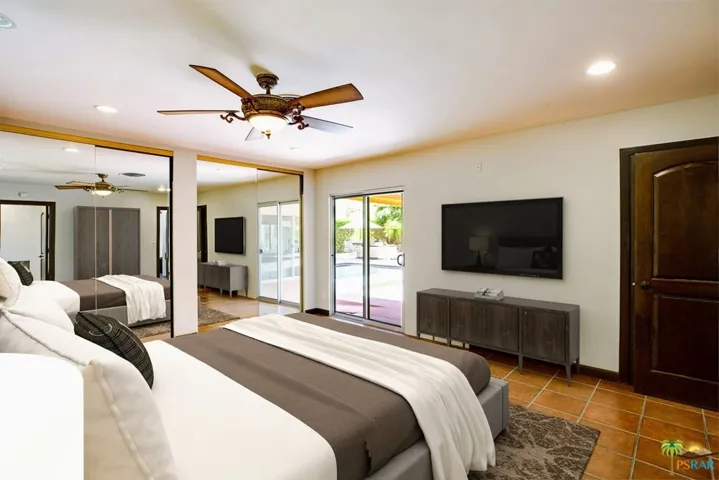 Virtually staged master bedroom with lar