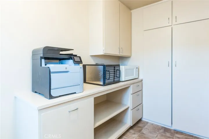 Inside Laundry Home with Cabinets