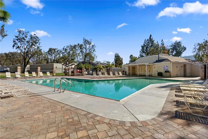 The ultimate getaway is in your own backyard.  Enjoy the beautiful community pool.  The vibe will have you feeling like you're on vacation without packing a single flip flop!