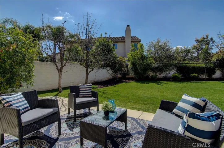 We have it all...huge lawn area, fruit trees, flower beds and more!