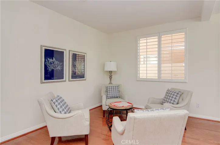 The builder offered this area as a downstairs 5th bedroom...easy to convert if desired, and is adjacent to downstairs full bath.