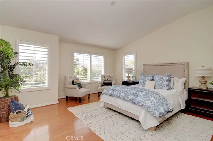 Master suite is another WOW with hardwood floors, king size bedroom and sitting area.