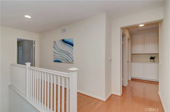 Upper foyer creates privacy and allows excellent transition between the three upper level bedroom wings.