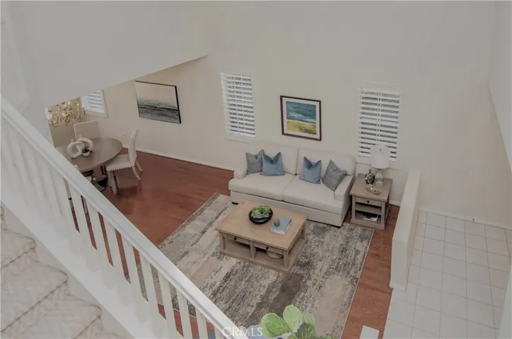So many great features here...beautiful "real" hardwood flooring throughout, plantation shutters throughout, fresh paint and new lux designer carpeting...and...enough room for all of YOUR stuff!