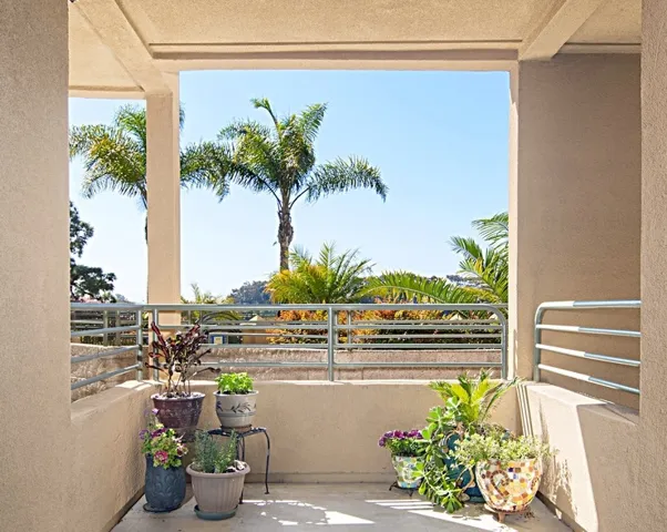 Southfacing covered patio is huge (much larger than in this photo) with paddle board storage area, closets and locked private door to spa and BBQ.