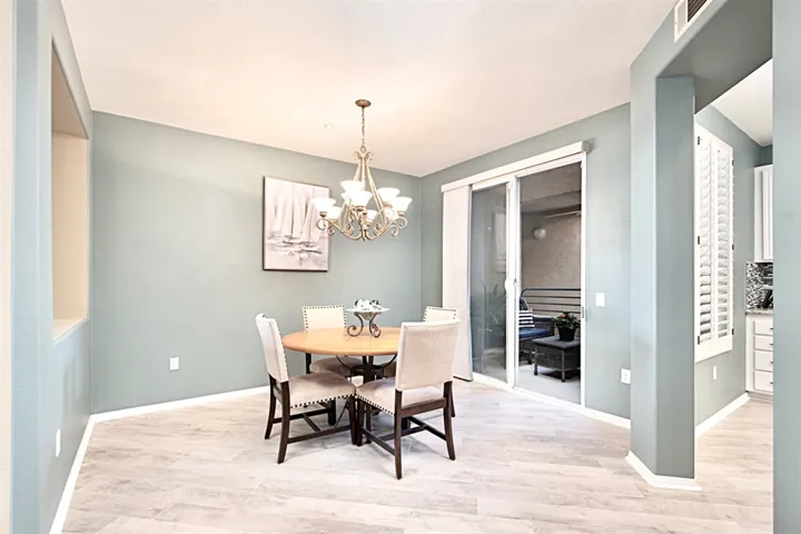 Large dining room steps out to another patio for easy entertainment flow.