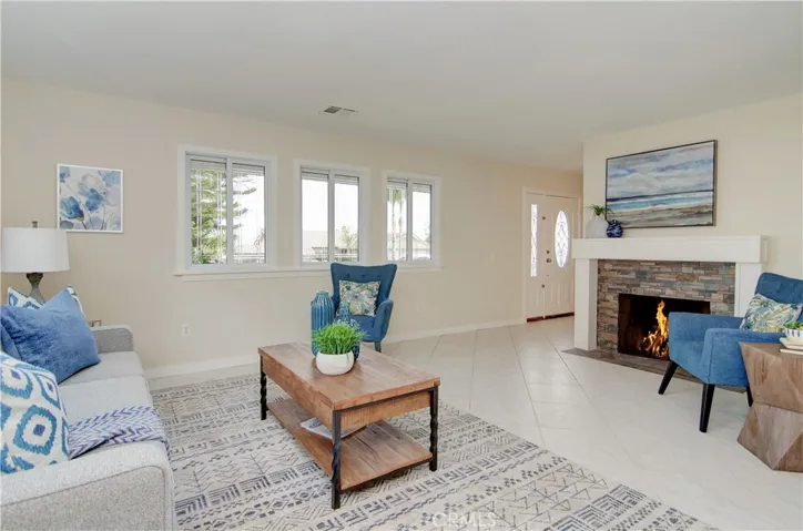 Easy care hard surface flooring throughout this entire home. Plus newer vinyl dual paned windows throughout, some with 'luxe' beveled details!