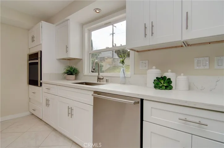 Brand new kitchen cabinets, quartz counters and stainless hardware.