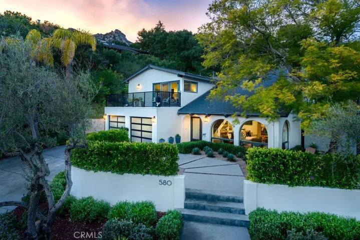 Stunning interior/exterior remodel of home was completed in 2016.  Exterior improvements included new roof, smooth finish stucco, custom concrete flat-work, smooth finish retaining walls, handcrafted railings, garage/entry doors, and professional landscaping.