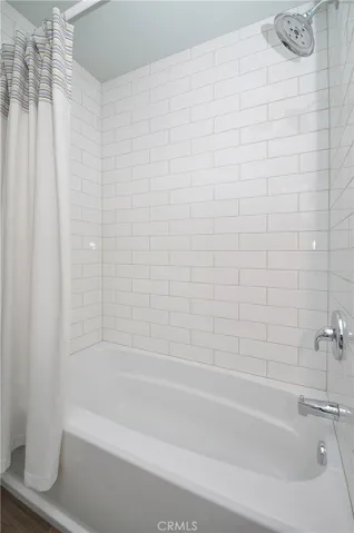 Full bath in upstairs hallway.