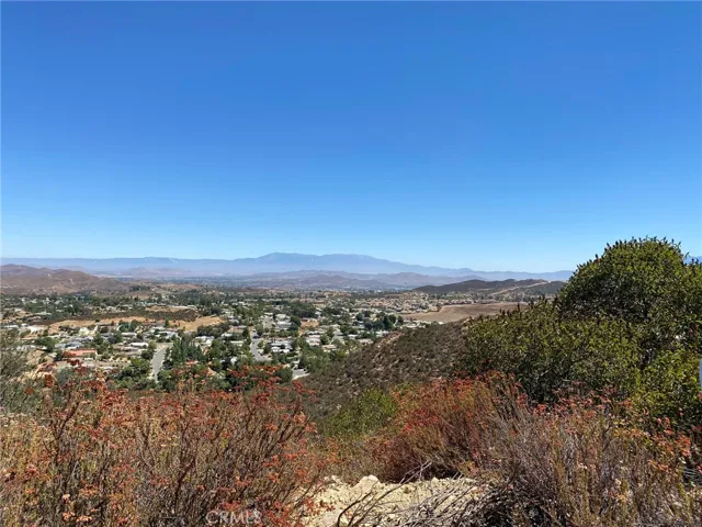 Hilltop view. Raw land ready for your vision.