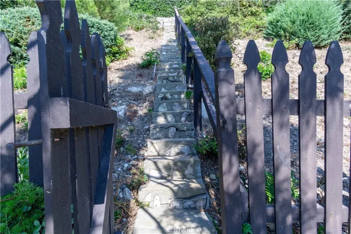 These steps will take you up to a deck with views of the Pacific Ocean, Catalina Island, and the Santa Monica mountains; weather permitting.