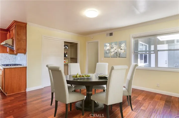 Virtually Staged Dining Area off Kitchen with Pantry