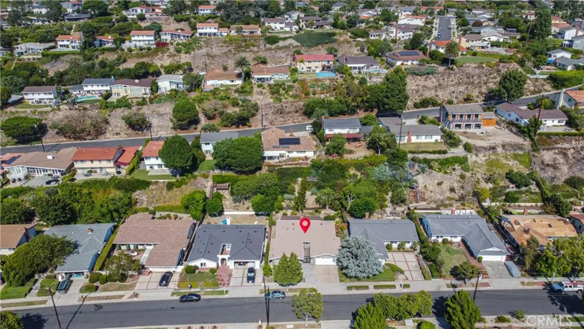 View down at property looking East. Eddinghill is the street above it.