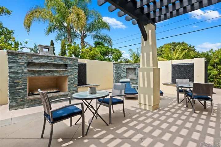 Outdoor Patio with 2 Waterfalls and Fireplace