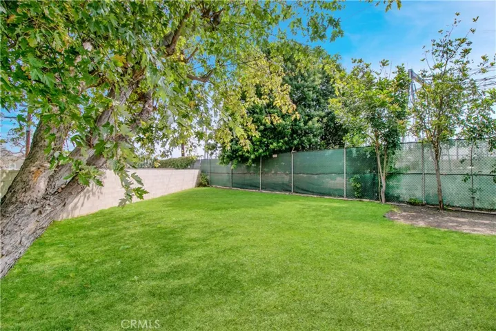Nearby park? Nope.... this is all yours! Kids of all ages will love playing, running and making joyful noise in this huge grassy yard.