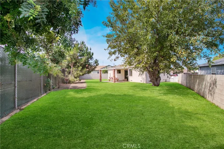 This amazing yard could be a stay-cation paradise!  Room for pool, spa, BBQ, sport court and more!