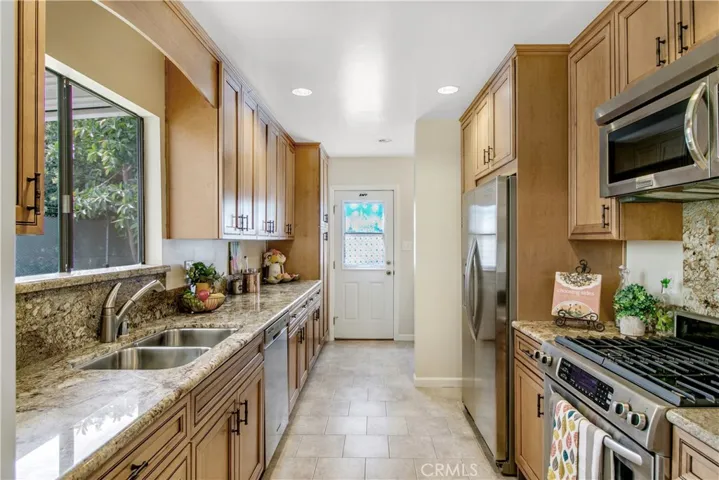 Gourmet kitchen is 100% remodeled. Enjoy the sunlit space as you create your culinary masterpieces!