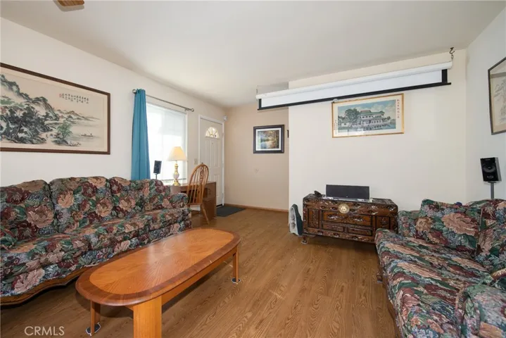 Spacious Front Family Room. Upgraded flooring.
