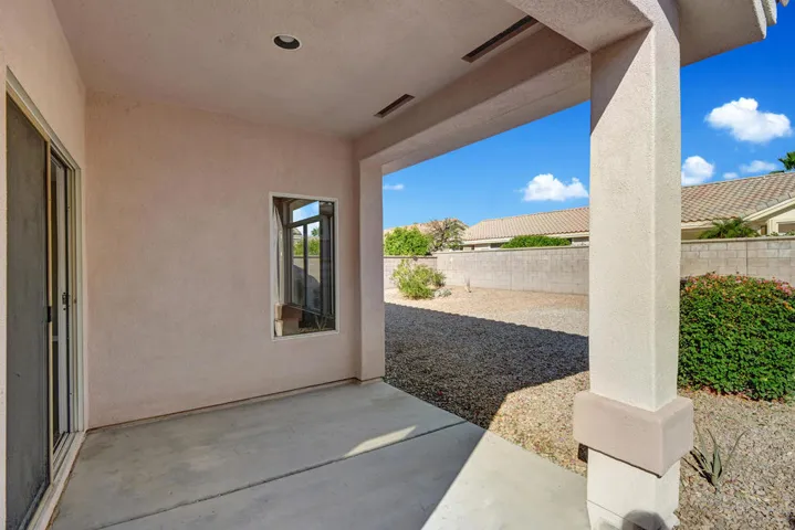 BACK COVERED PATIO TO YARD
