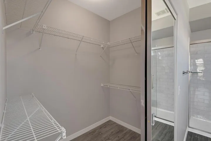 PRIMARY BEDROOM WALK IN CLOSET