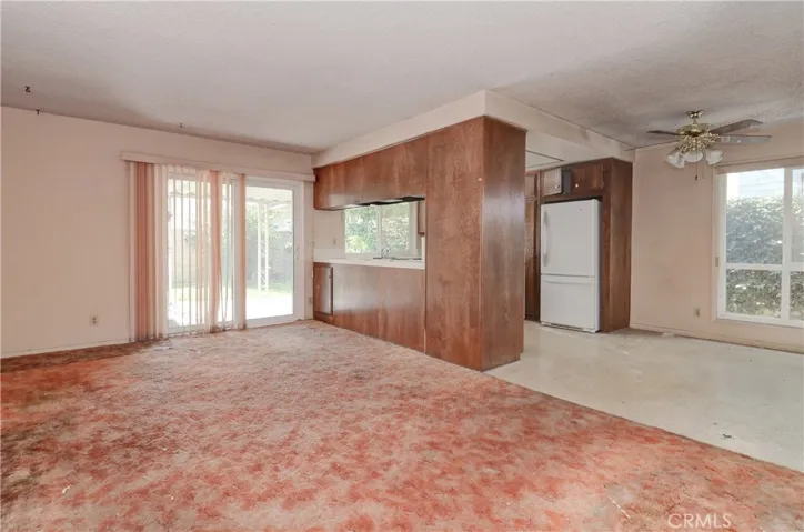 Family Room view to Kitchen Breakfast Nook & Kitchen.