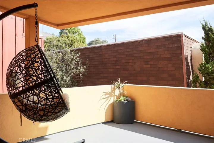 2nd level patio off of the kitchen and living spaces.